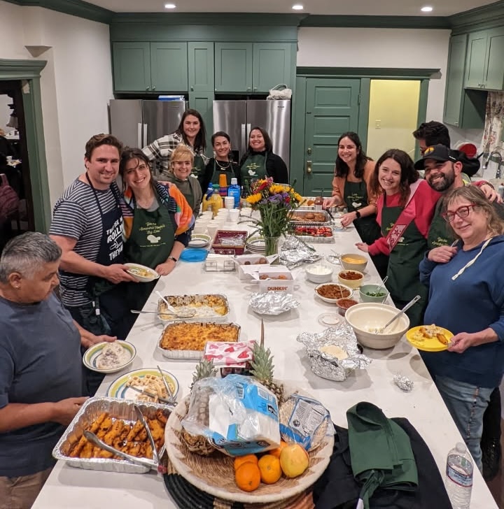 Be Kind Connection board members Laura and Kristin and founder Craig with volunteers at the September 2025 Alexandria House dinner