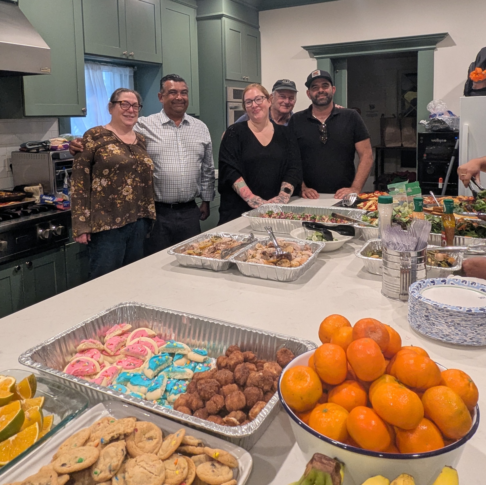 Pam, Mario, Jen, Mark, and Craig at a Be Kind Connection community dinner at Alexandria House in Los Angeles